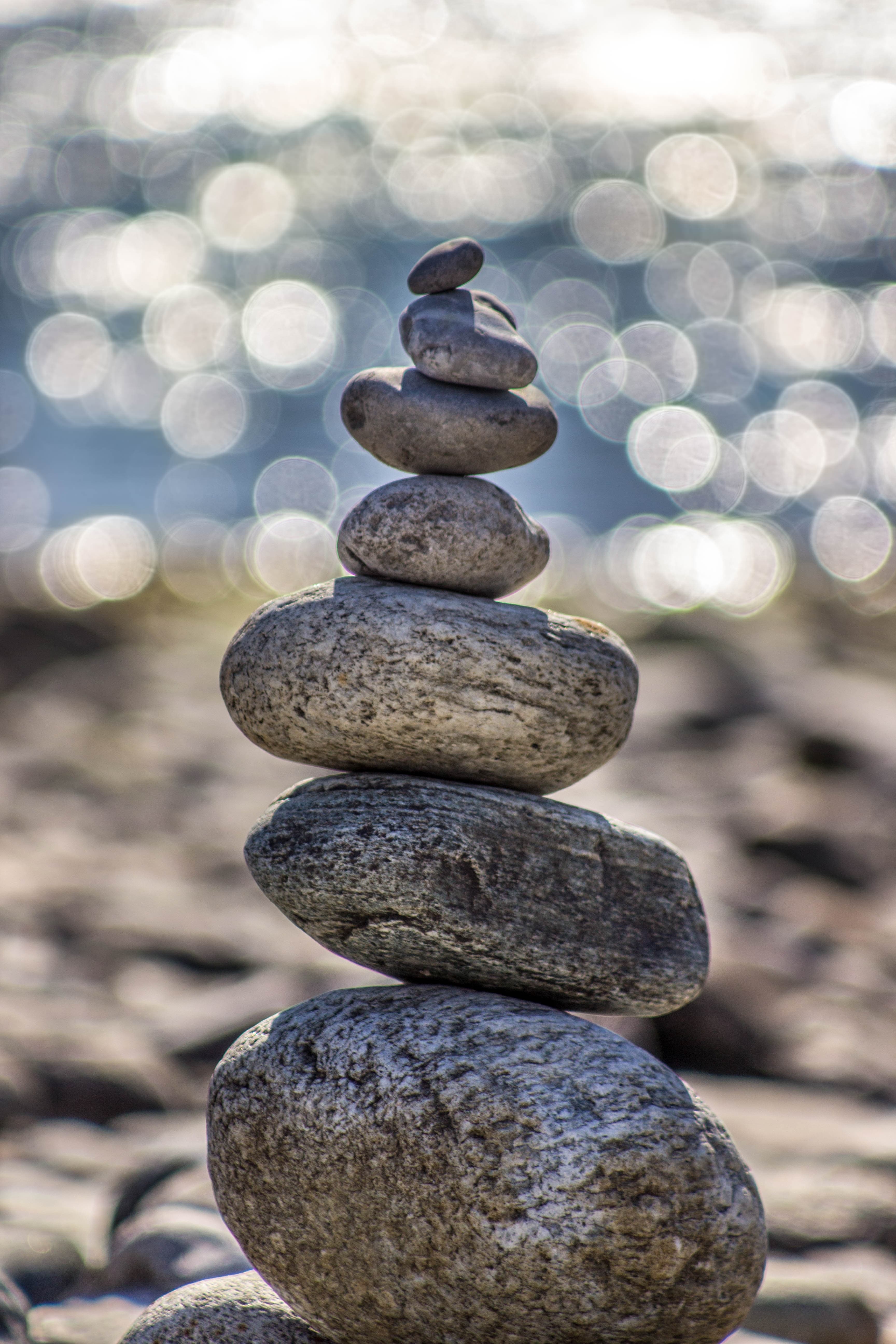 Rocks stacked 7 high with biggest at the bottom to smallest at the top